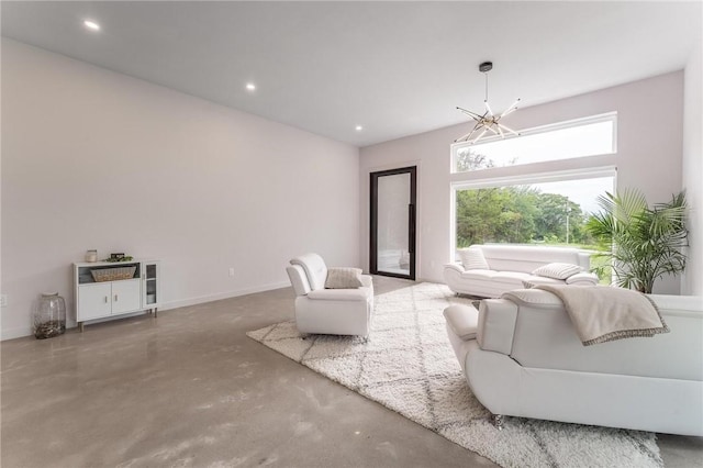 1630 Madison Unit 7855, Huntsville, AR 72740 - living area featuring concrete flooring, a chandelier, and recessed lighting