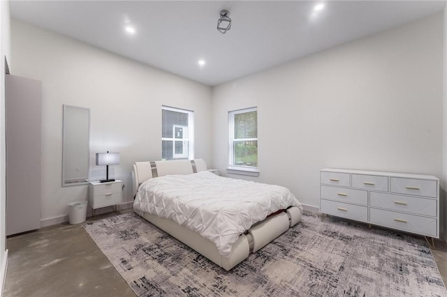 1630 Madison Unit 7855, Huntsville, AR 72740 - bedroom featuring concrete floors and recessed lighting