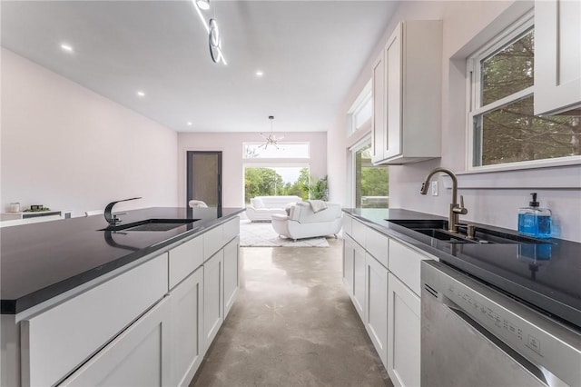 1630 Madison Unit 7855, Huntsville, AR 72740 - kitchen featuring dishwasher, dark countertops, white cabinetry, concrete floors, and recessed lighting