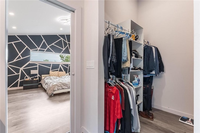 1630 Madison Unit 7855, Huntsville, AR 72740 - spacious closet featuring wood finished floors