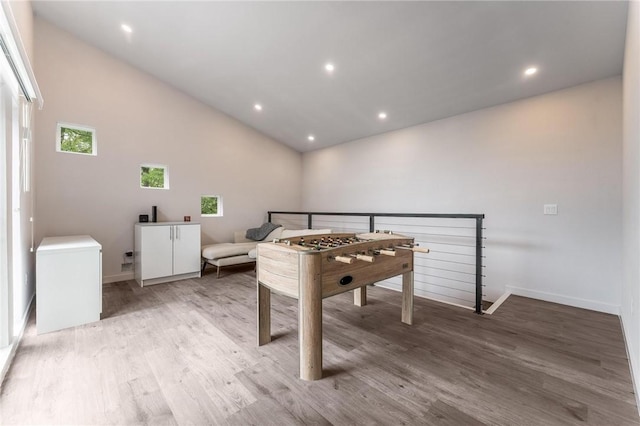1630 Madison Unit 7855, Huntsville, AR 72740 - recreation room with light wood-style flooring, vaulted ceiling, and recessed lighting