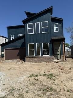 1301 SW Journey Ln, Bentonville, AR 72713 - rear view of property featuring board and batten siding