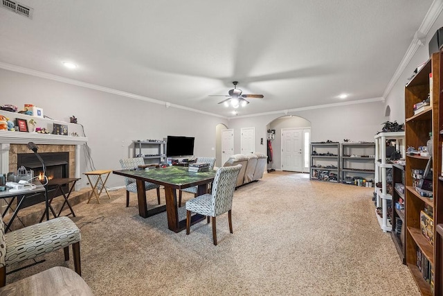 1902 SW Sequoia St, Bentonville, AR 72713 - carpeted office space featuring ceiling fan, ornamental molding, a tiled fireplace, arched walkways, and recessed lighting