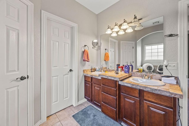 1902 SW Sequoia St, Bentonville, AR 72713 - bathroom featuring tile patterned floors and double vanity