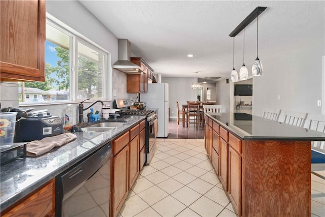 713 Carlton St, Springdale, AR 72762 - kitchen with stainless steel gas stove, black dishwasher, wall chimney exhaust hood, decorative light fixtures, and brown cabinets