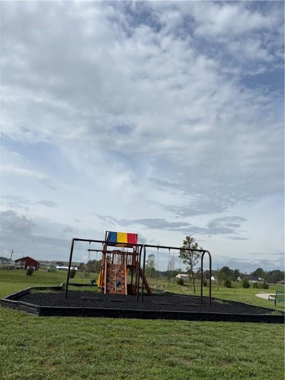 825 Bellagiola, Tontitown, AR 72762 - communal playground featuring a lawn