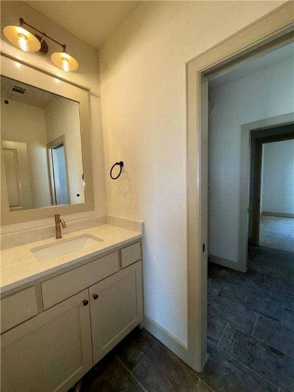 825 Bellagiola, Tontitown, AR 72762 - bathroom featuring baseboards and vanity