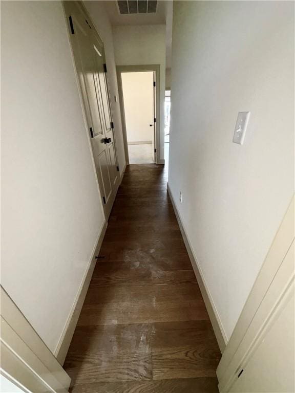 825 Bellagiola, Tontitown, AR 72762 - hallway with dark wood finished floors and baseboards