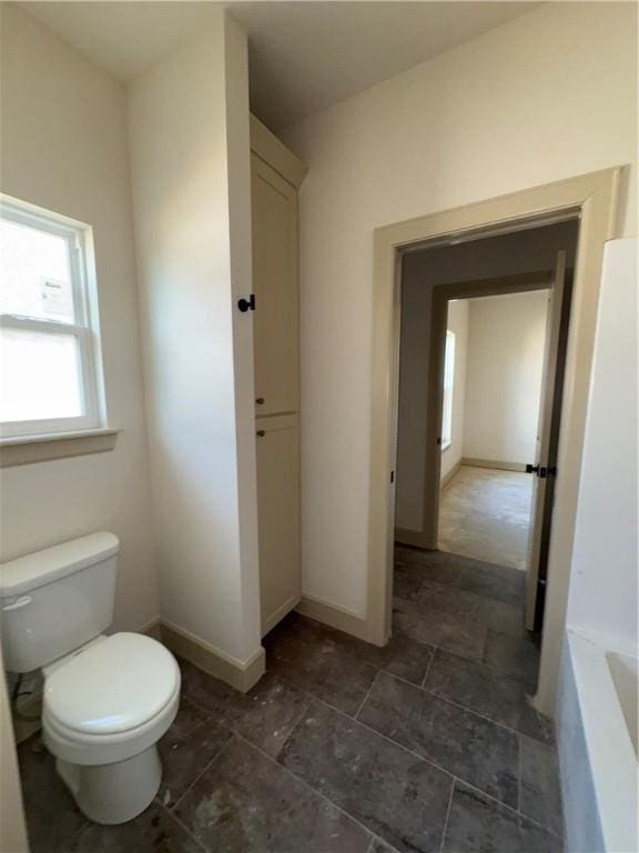 825 Bellagiola, Tontitown, AR 72762 - full bathroom featuring toilet and a tub to relax in