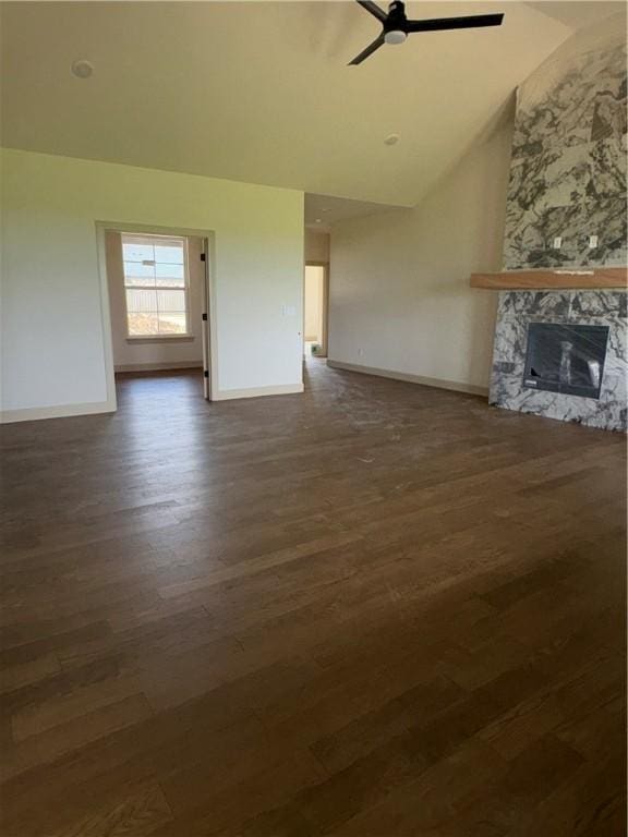 825 Bellagiola, Tontitown, AR 72762 - unfurnished living room with dark wood finished floors, a ceiling fan, high vaulted ceiling, and a fireplace