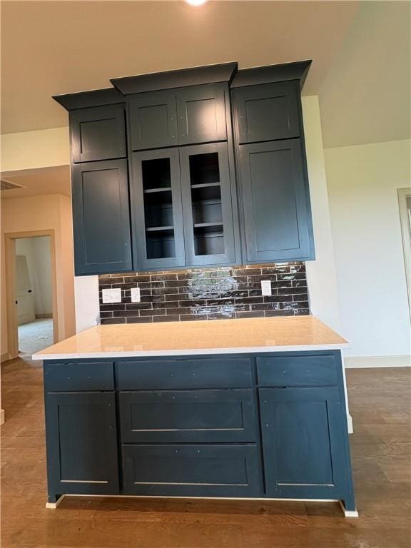 825 Bellagiola, Tontitown, AR 72762 - bar area featuring tasteful backsplash and dark wood-type flooring