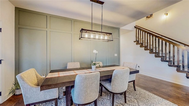 884 Ardiano Ave, Tontitown, AR 72762 - dining room featuring stairway and dark wood-type flooring