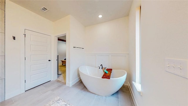 884 Ardiano Ave, Tontitown, AR 72762 - full bathroom with a freestanding tub, a wainscoted wall, and recessed lighting