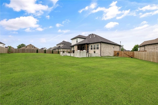 320 Bequette Ln, Centerton, AR 72719 - back of house featuring a fenced backyard, roof with shingles, and stone siding