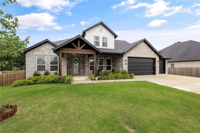 320 Bequette Ln, Centerton, AR 72719 - view of front facade with brick siding, driveway, and a garage