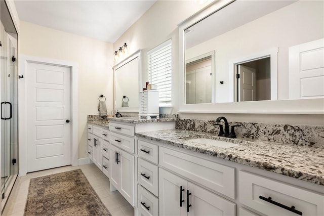 320 Bequette Ln, Centerton, AR 72719 - bathroom with double vanity and a shower stall