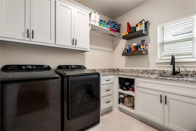 320 Bequette Ln, Centerton, AR 72719 - laundry area with washer and clothes dryer and cabinet space