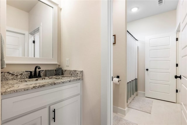320 Bequette Ln, Centerton, AR 72719 - full bath with vanity, tile patterned floors, and curtained shower