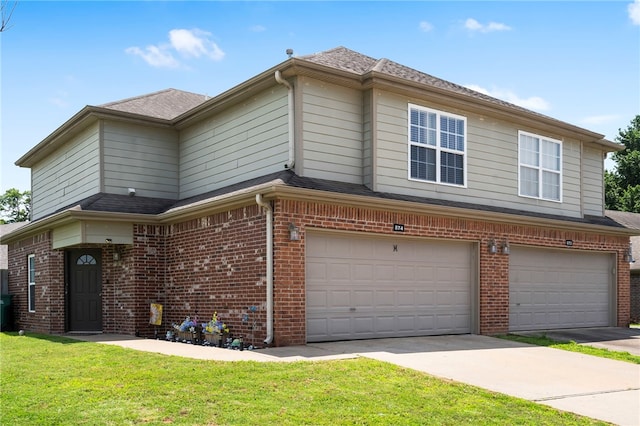 874 Oakwood Ln, Centerton, AR 72719 - view of front of property with a garage, brick siding, a front lawn, and driveway