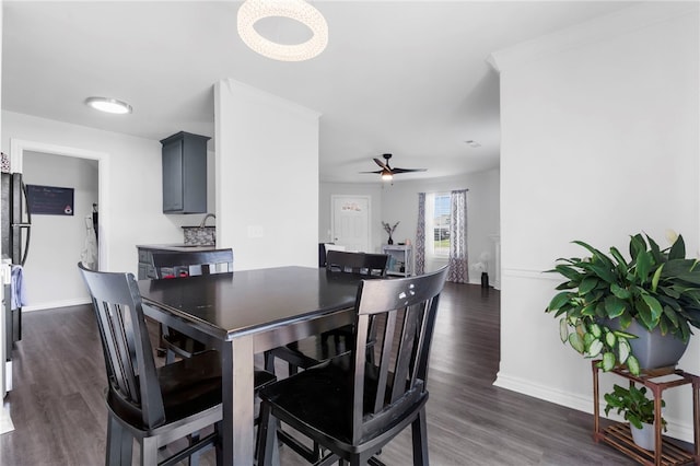 874 Oakwood Ln, Centerton, AR 72719 - dining space with dark wood finished floors and a ceiling fan