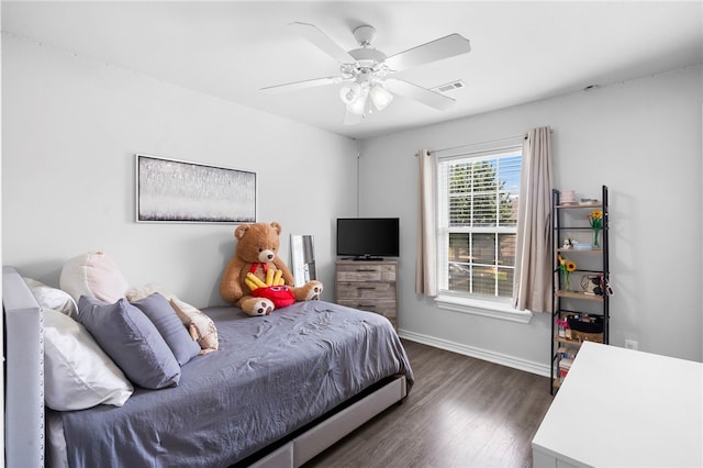 874 Oakwood Ln, Centerton, AR 72719 - bedroom with dark wood finished floors and ceiling fan