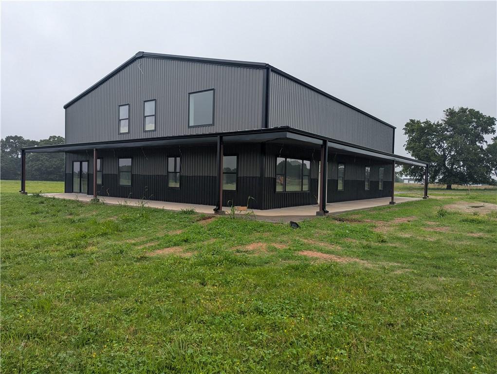 17159 Mill Hill Rd, Garfield, AR 72732 - back of property featuring a lawn