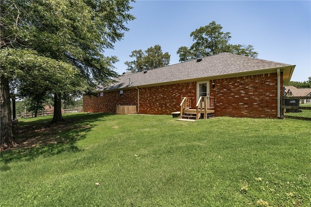 217 Waterfront Cir, Alma, AR 72921 - rear view of house featuring brick siding and roof with shingles