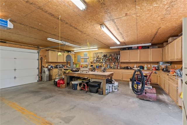 217 Waterfront Cir, Alma, AR 72921 - garage with a workshop area