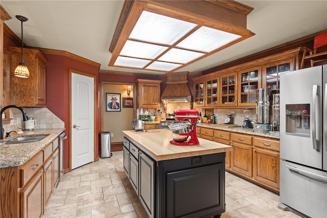 217 Waterfront Cir, Alma, AR 72921 - kitchen with appliances with stainless steel finishes, custom exhaust hood, wood counters, and stone tile floors