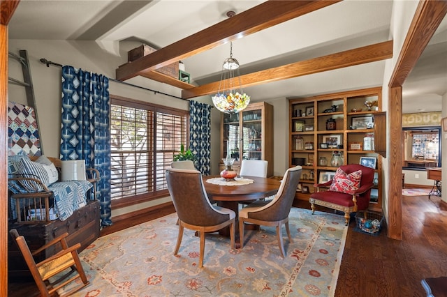 217 Waterfront Cir, Alma, AR 72921 - dining space featuring wood finished floors, beam ceiling, and a chandelier