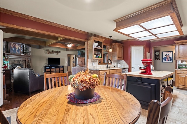 217 Waterfront Cir, Alma, AR 72921 - dining area featuring a large fireplace, a ceiling fan, and crown molding