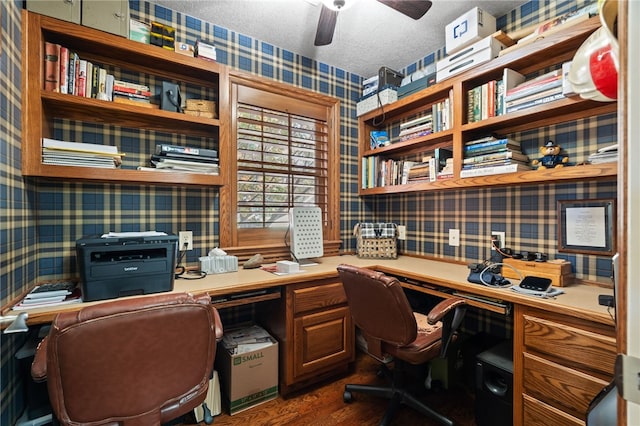217 Waterfront Cir, Alma, AR 72921 - office space with wallpapered walls, built in desk, a ceiling fan, dark wood-style floors, and a textured ceiling