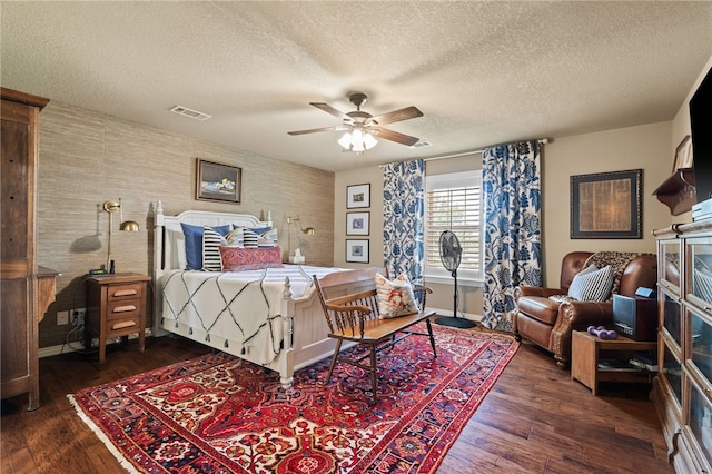 217 Waterfront Cir, Alma, AR 72921 - bedroom with a textured ceiling, dark wood-style flooring, and ceiling fan