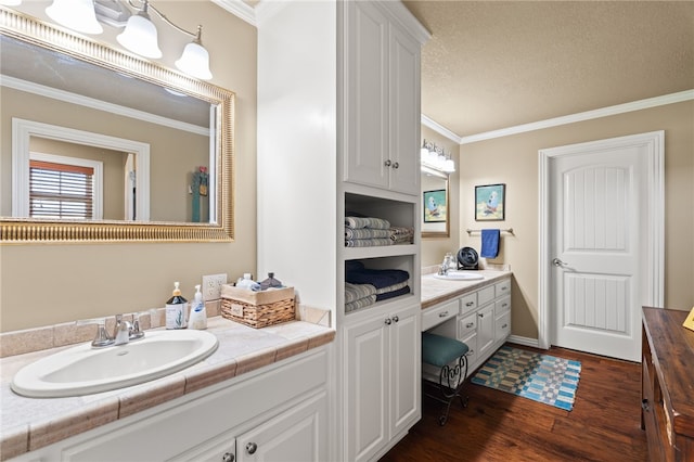 217 Waterfront Cir, Alma, AR 72921 - bathroom featuring vanity, wood finished floors, crown molding, and a textured ceiling