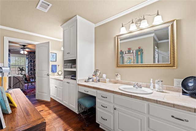 217 Waterfront Cir, Alma, AR 72921 - bathroom featuring wood finished floors, crown molding, a ceiling fan, and vanity