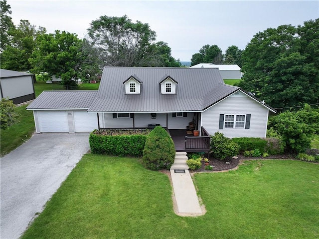 4639 Quail Ct, Harrison, AR 72601 - cape cod house with an attached garage, asphalt driveway, covered porch, a front lawn, and a metal roof