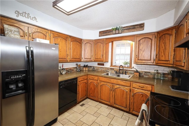 4639 Quail Ct, Harrison, AR 72601 - kitchen featuring stainless steel refrigerator with ice dispenser, dishwasher, brown cabinetry, range with electric stovetop, and a textured ceiling