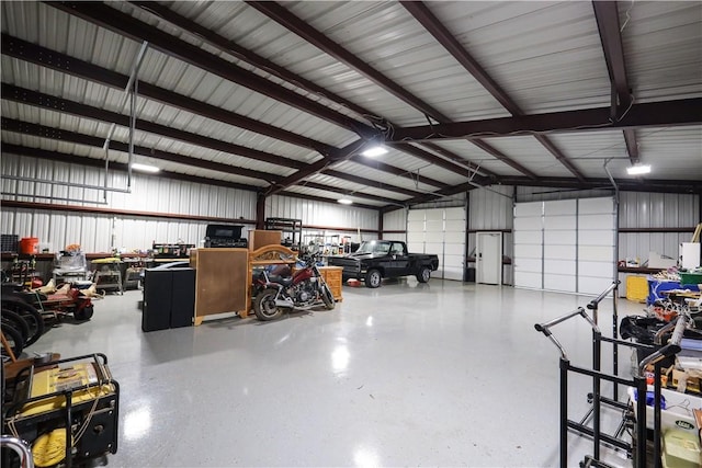4639 Quail Ct, Harrison, AR 72601 - garage with metal wall and a workshop area