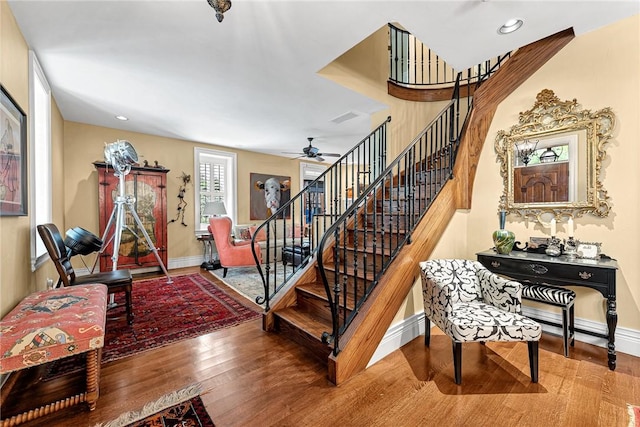 32 Armstrong St, Eureka Springs, AR 72632 - staircase with wood finished floors, ceiling fan, and recessed lighting