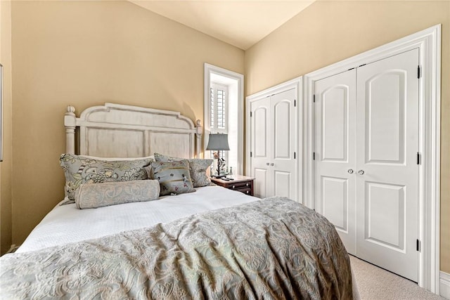 32 Armstrong St, Eureka Springs, AR 72632 - bedroom with two closets and carpet flooring