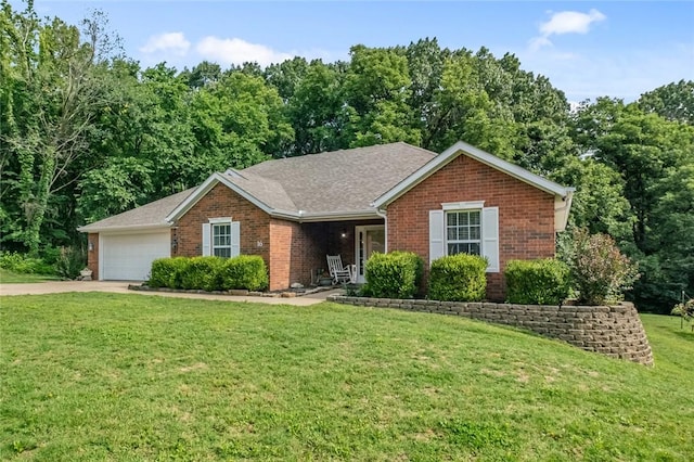 16 Olmsted Ln, Bella Vista, AR 72715 - ranch-style house featuring brick siding, a front yard, concrete driveway, an attached garage, and roof with shingles