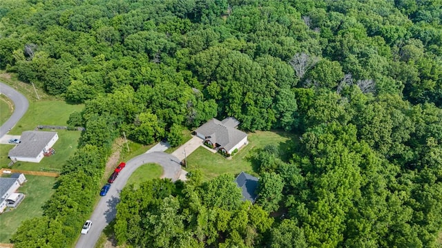 16 Olmsted Ln, Bella Vista, AR 72715 - aerial view of property and surrounding area featuring a heavily wooded area