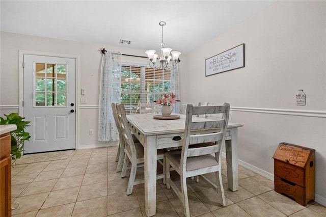 16 Olmsted Ln, Bella Vista, AR 72715 - dining area with a chandelier and light tile patterned floors