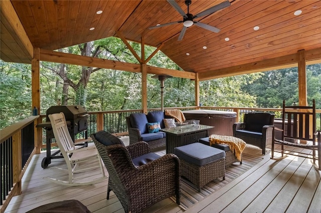 16 Olmsted Ln, Bella Vista, AR 72715 - deck with a hot tub, a ceiling fan, an outdoor hangout area, and grilling area