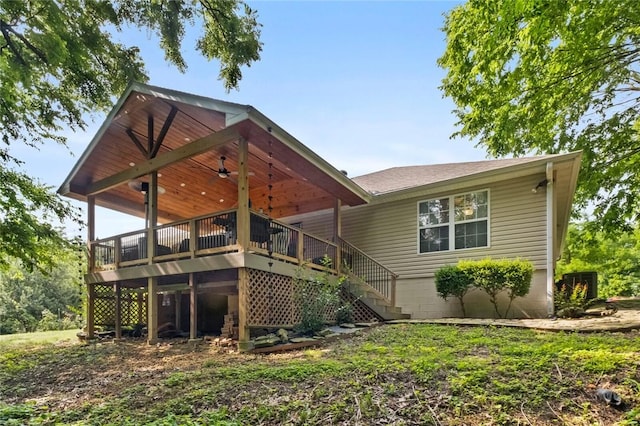 16 Olmsted Ln, Bella Vista, AR 72715 - rear view of house featuring stairs, a deck, and a shingled roof