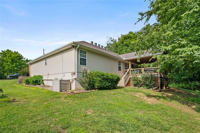 16 Olmsted Ln, Bella Vista, AR 72715 - rear view of property featuring stairs, a yard, and a wooden deck