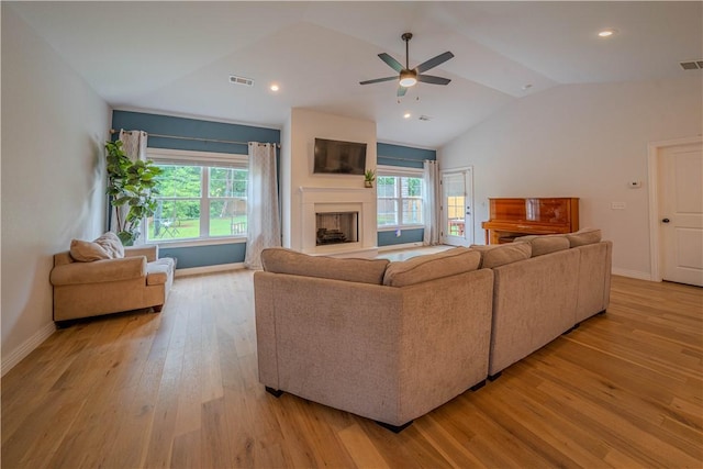 1312 Park St, Lowell, AR 72745 - living room featuring vaulted ceiling, ceiling fan, light wood-style flooring, plenty of natural light, and recessed lighting