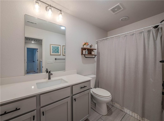1312 Park St, Lowell, AR 72745 - bathroom featuring vanity and curtained shower