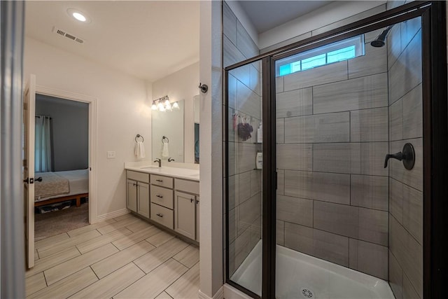 1312 Park St, Lowell, AR 72745 - bathroom with double vanity, a stall shower, and ensuite bath