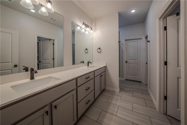1312 Park St, Lowell, AR 72745 - bathroom with double vanity and recessed lighting